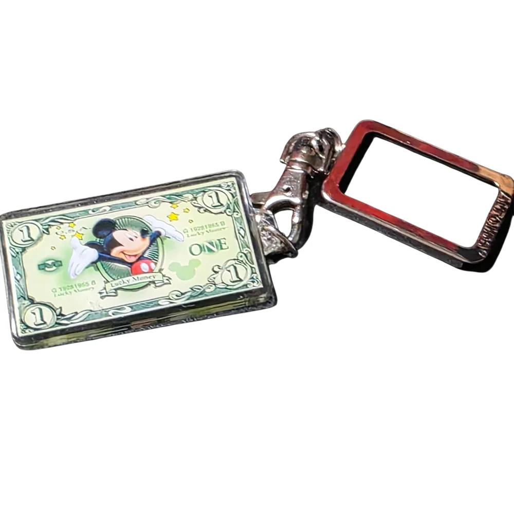Silver Keychain with Cartoon Design